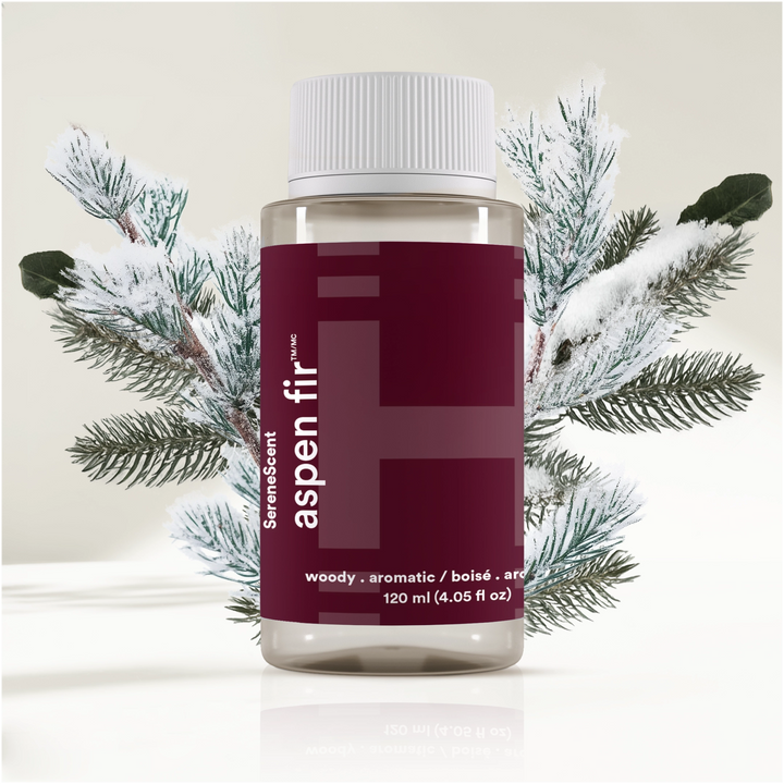 SereneScent™ Aspen Fir with snowy pine branches on a light background