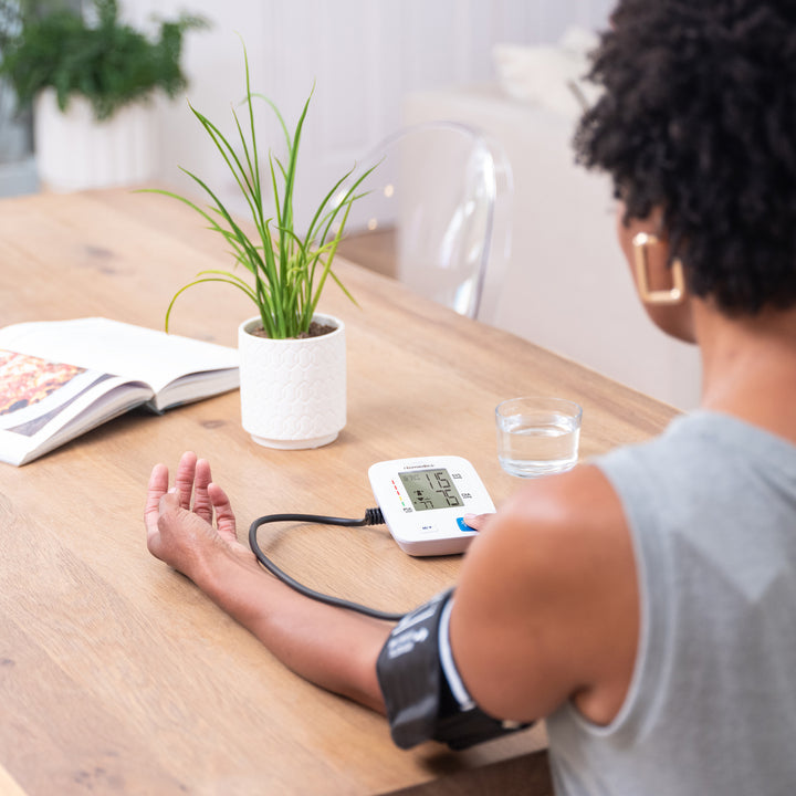 women using Homedics® Upper Arm 400 Series Blood Pressure Monitor