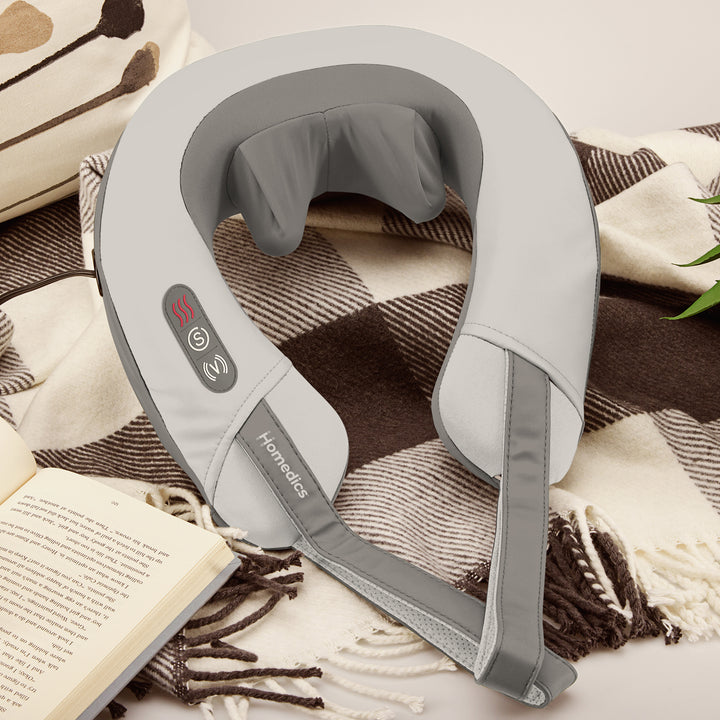 Lifestyle image of the Homedics Pro Therapy Elite - Shiatsu and Vibration Neck Massager with Book