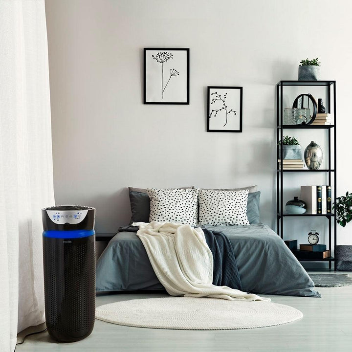 Black | A black Homedics TotalClean 5-in-1 UV-C Deluxe Large Room Air Purifier sits in bedroom