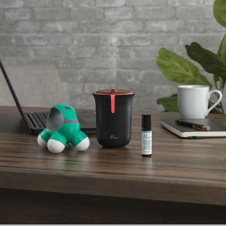 Homedics Stress Release Relaxation Kit on desk next to laptop