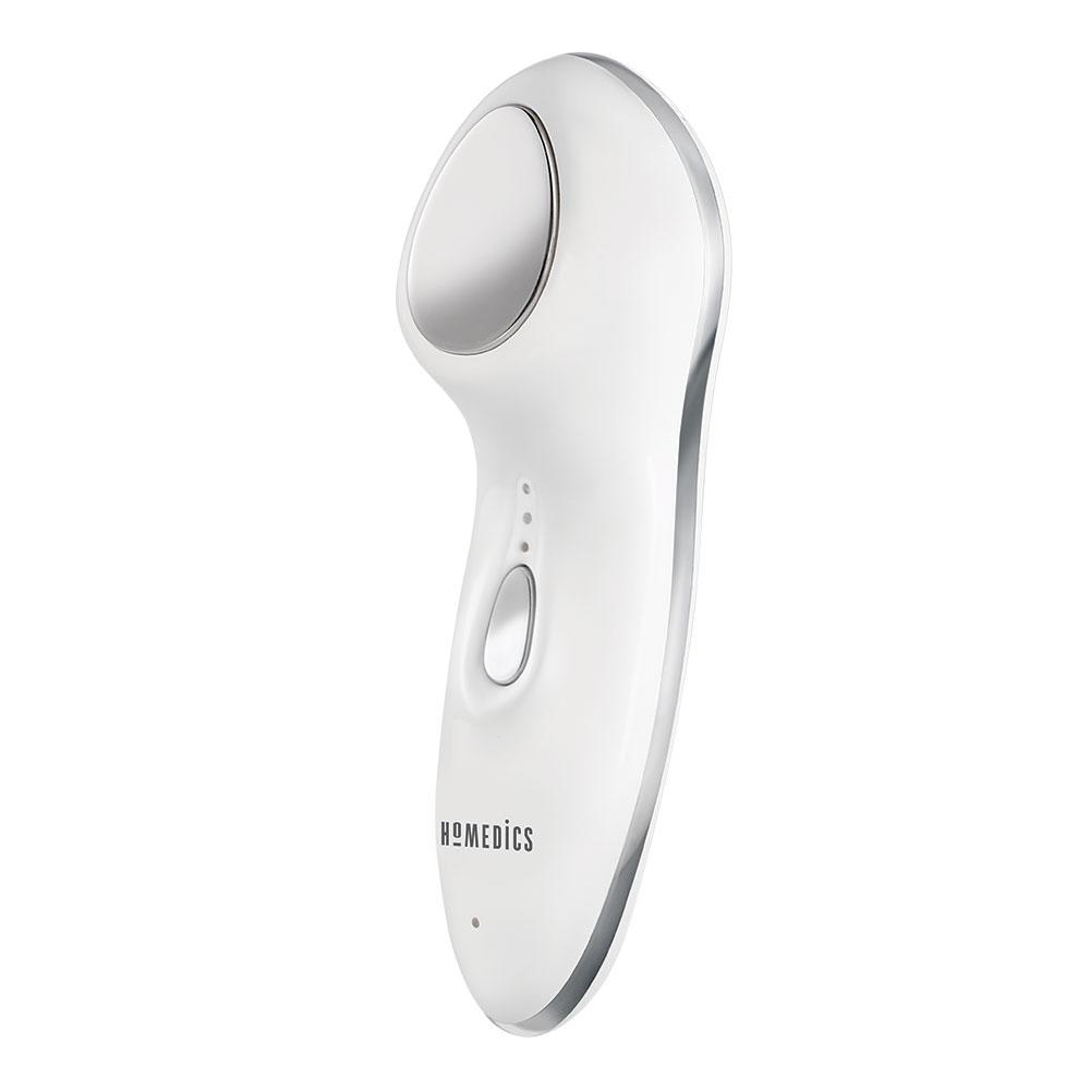 Woman smiles while holding Homedics Duo Climate Hot and Cold Sonic Facial Wand to left temple