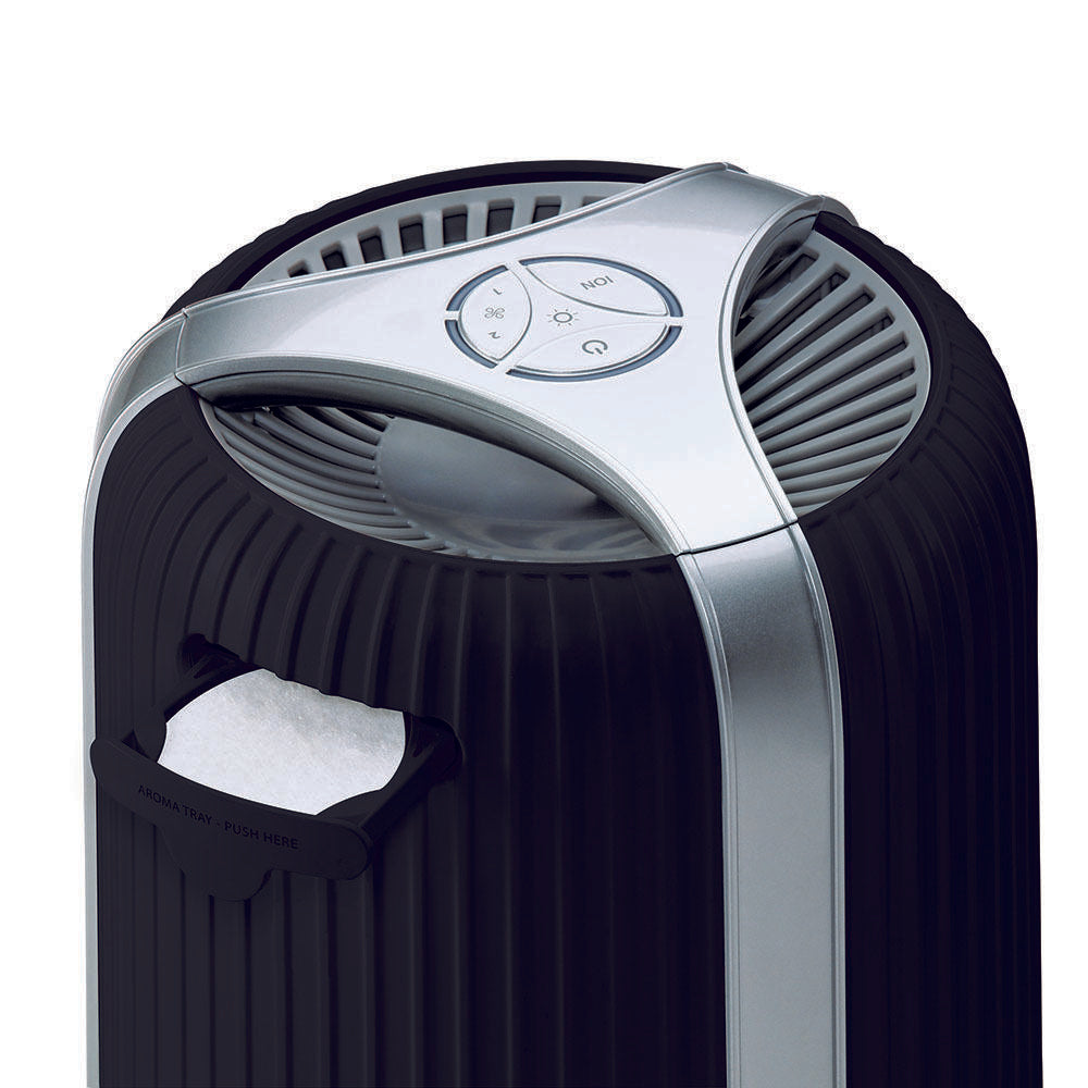 Black | Close-up view of the essential oils tray on the black Homedics TotalClean 4-in-1 Small Room Air Purifier