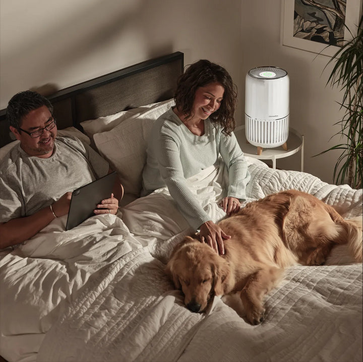 User controlling various functionalities of the Smart Air Purifier T200 from smartphone