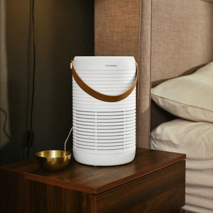 Air Purifier T95 fits on a bedside table