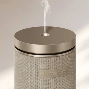 Image displaying a closeup of mist coming out of SereneScent™ Fabric Waterless Diffuser