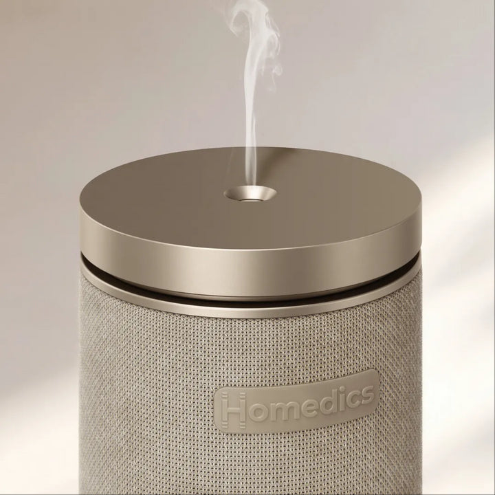Image displaying a closeup of mist coming out of SereneScent™ Fabric Waterless Diffuser