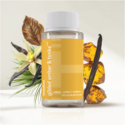 SereneScent™ Gilded Amber & Tonka with vanilla bean, amber, and tonka beans on a light background