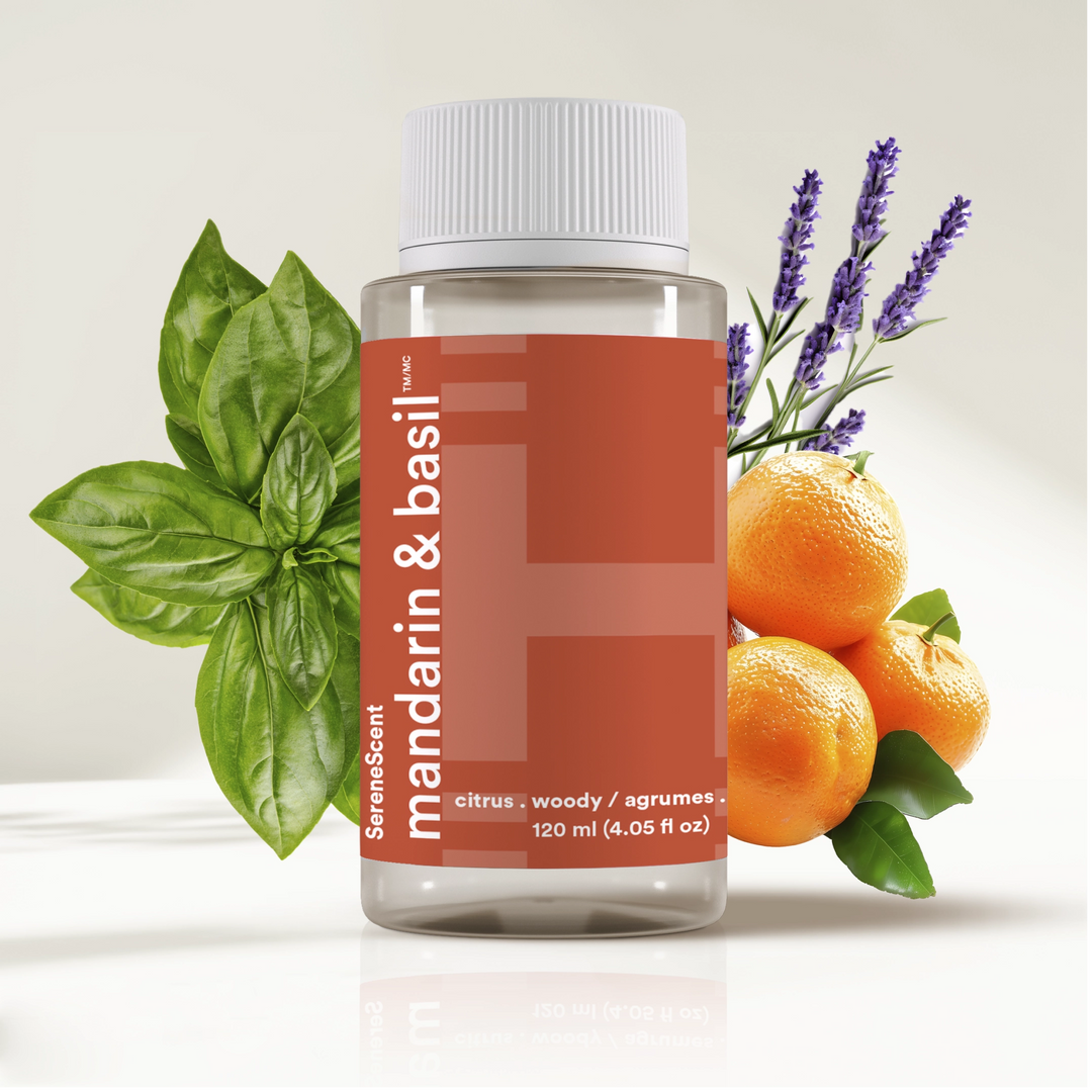 SereneScent™ Mandarin & Basil with mandarin oranges and basil leaves on a light background