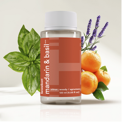 SereneScent™ Mandarin & Basil with mandarin oranges and basil leaves on a light background