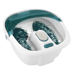 After soaking her feet in the Bubble Spa Elite Footbath, she uses the included pumice stone to exfoliate her feet