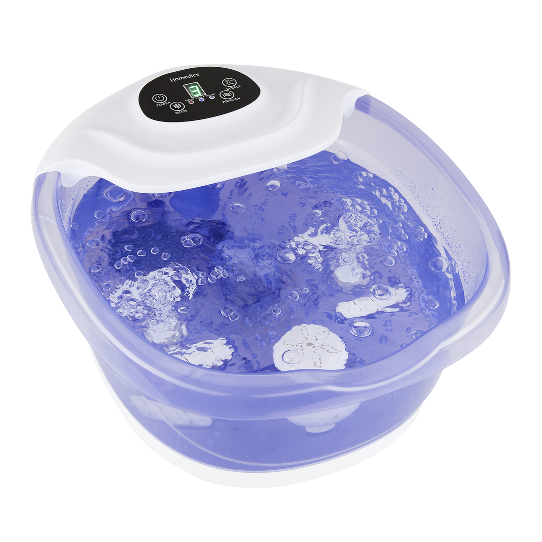 Feet in the Salt-N-Soak Footbath with Heat Boost with listed features. Heat boost with 3 levels, 4 pressure rollers and invigorating bubbles