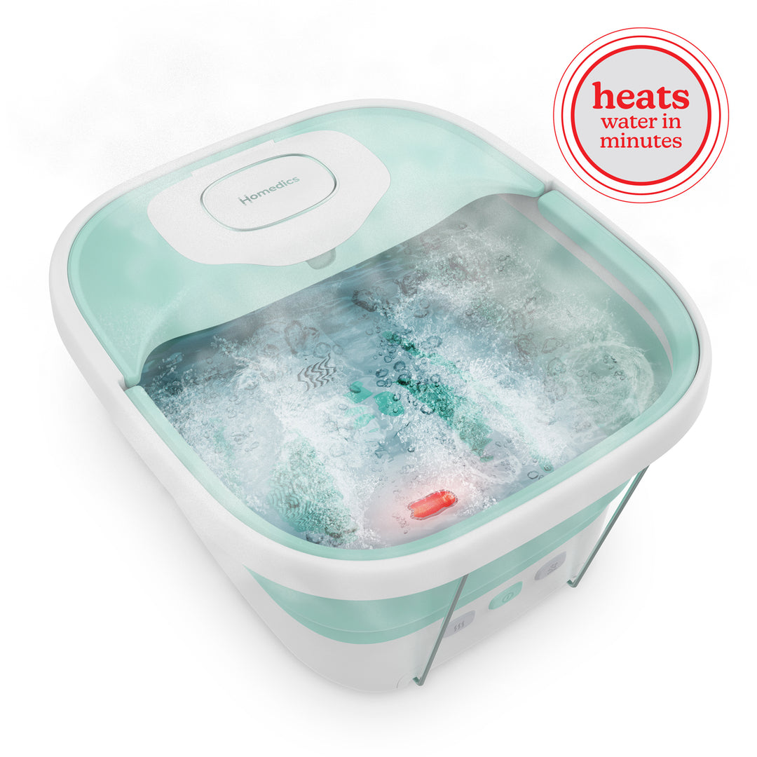 Homedics® Smart Space Elite Footbath with Heat Boost is helping the woman soak and relax her feet.