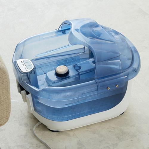 Angled view of the Homedics 2-in-1 Sauna and Footbath with Heat Boost Power sitting on the floor