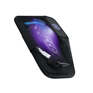 Rendered x-ray image of Homedics UV CLEAN Portable Sanitizer Case with keys and baby pacifier being cleaned