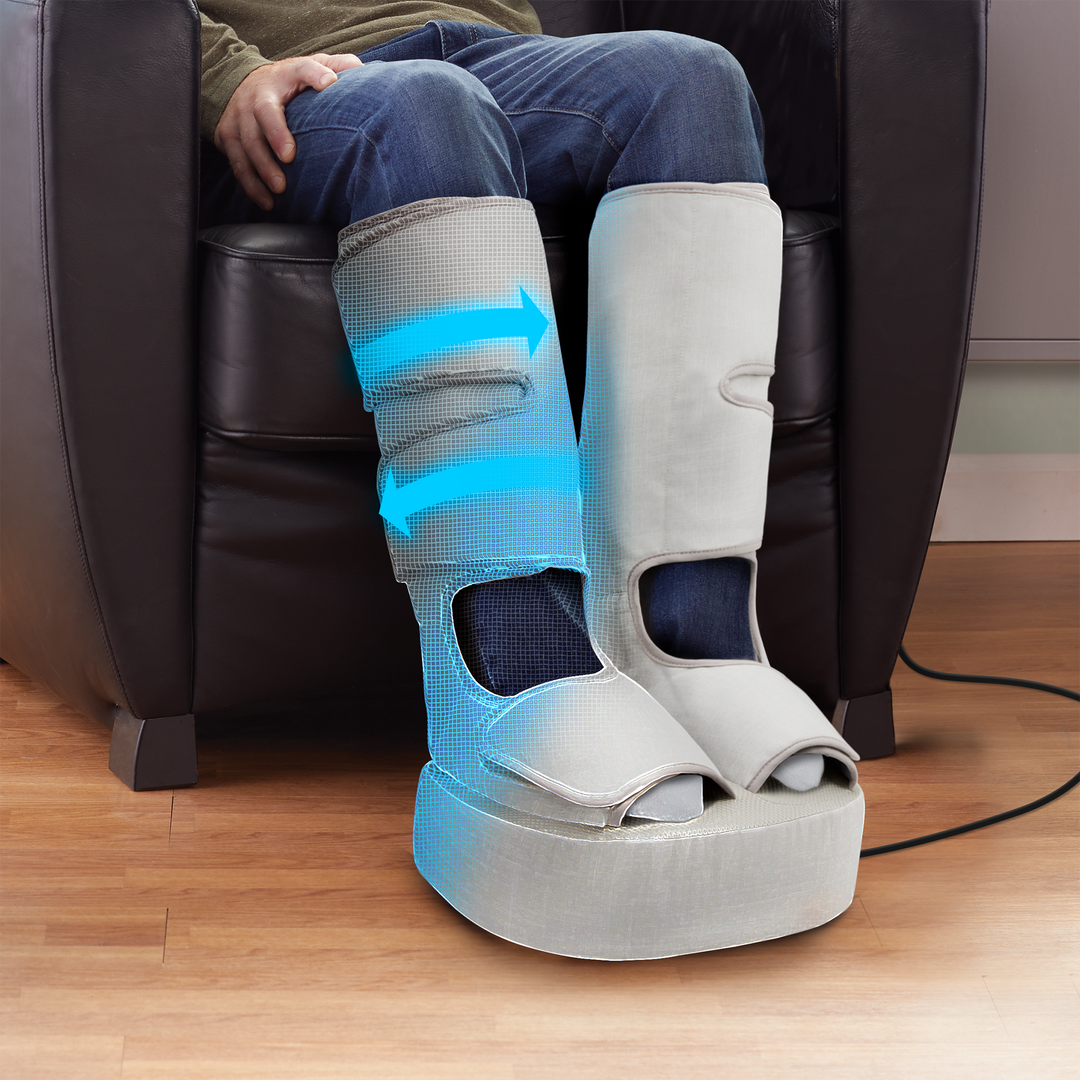 Man sitting with close up of his Homedics Real Relief Leg & Foot Massager showing arrows where the massaging air chambers