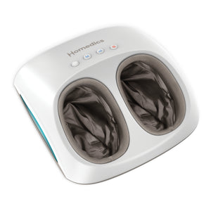 Lifestyle shot featuring the HoMedics® Shiatsu + Air 4.0 Foot Massager with Heat in use.