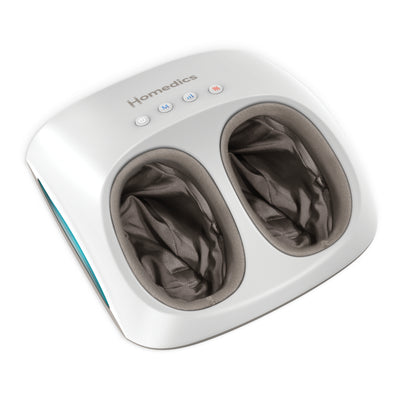 Lifestyle shot featuring the HoMedics® Shiatsu + Air 4.0 Foot Massager with Heat in use.