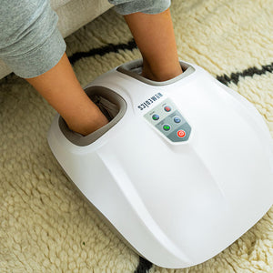 Feet inside the Homedics Shiatsu Air 2.0 Foot Massager with Heat