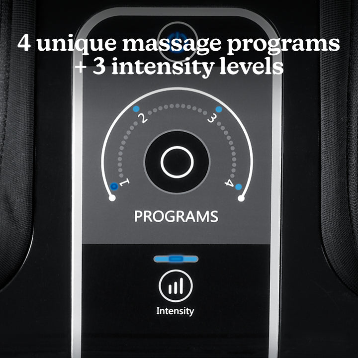 Woman sitting on couch with family while enjoying a massage from the Homedics Therapist Select Foot and Calf Massager