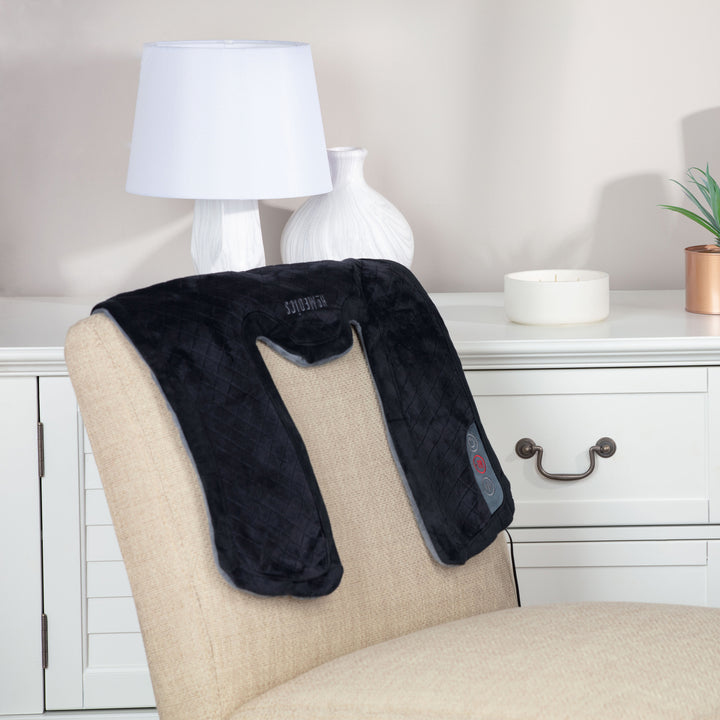 When out of use, the Homedics Thera-P Heated Neck and Shoulder Massager drapes over a chair