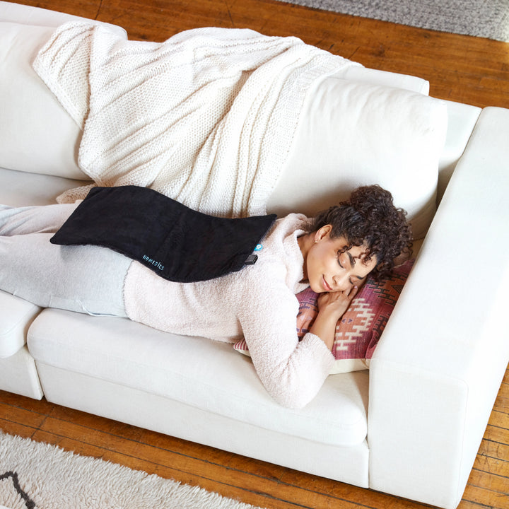 women using Weighted Hot & Cold Gel Heating Pad