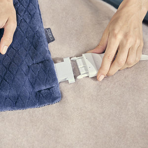 Hands connect the analog LED controller to the Homedics 12 x 24 Weighted Massaging Heating Pad