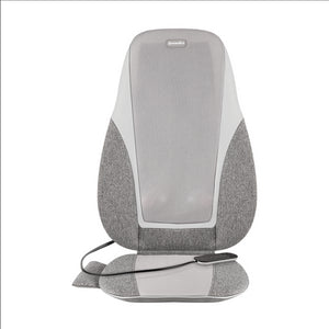 Close view of Woman relaxes her back on the Homedics Shiatsu + Kneading and Vibration Massage Cushion with Heat on chair