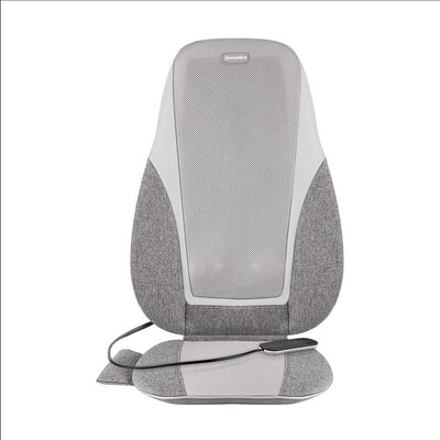 Close view of Woman relaxes her back on the Homedics Shiatsu + Kneading and Vibration Massage Cushion with Heat on chair
