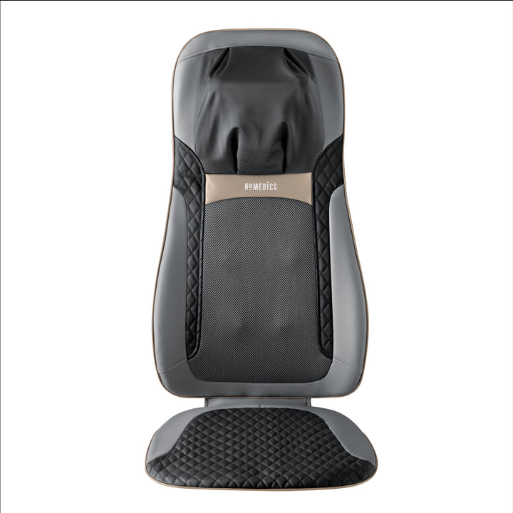 Woman in chair relaxes while enjoying a massage from the Homedics Shiatsu Elite II Massage Cushion with Soothing Heat