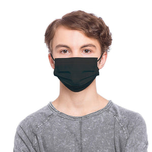 Front view of boy wearing a Homedics Small Size Black Ear-Loop Face Masks (50 Count)