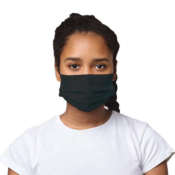 Front view of girl wearing a Homedics Small Size Black Ear-Loop Face Masks (50 Count)