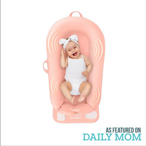 Coral | Homedics® 3-in-1 Calming Cushion in Coral color, featuring 3-in-1 functionality with soothing sounds which will make baby happy and comfortable.