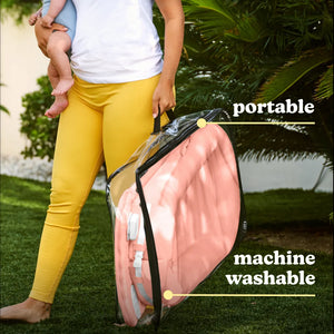 Coral | Homedics® 3-in-1 Calming Cushion in Coral, showcasing its portability and machine washable feature.