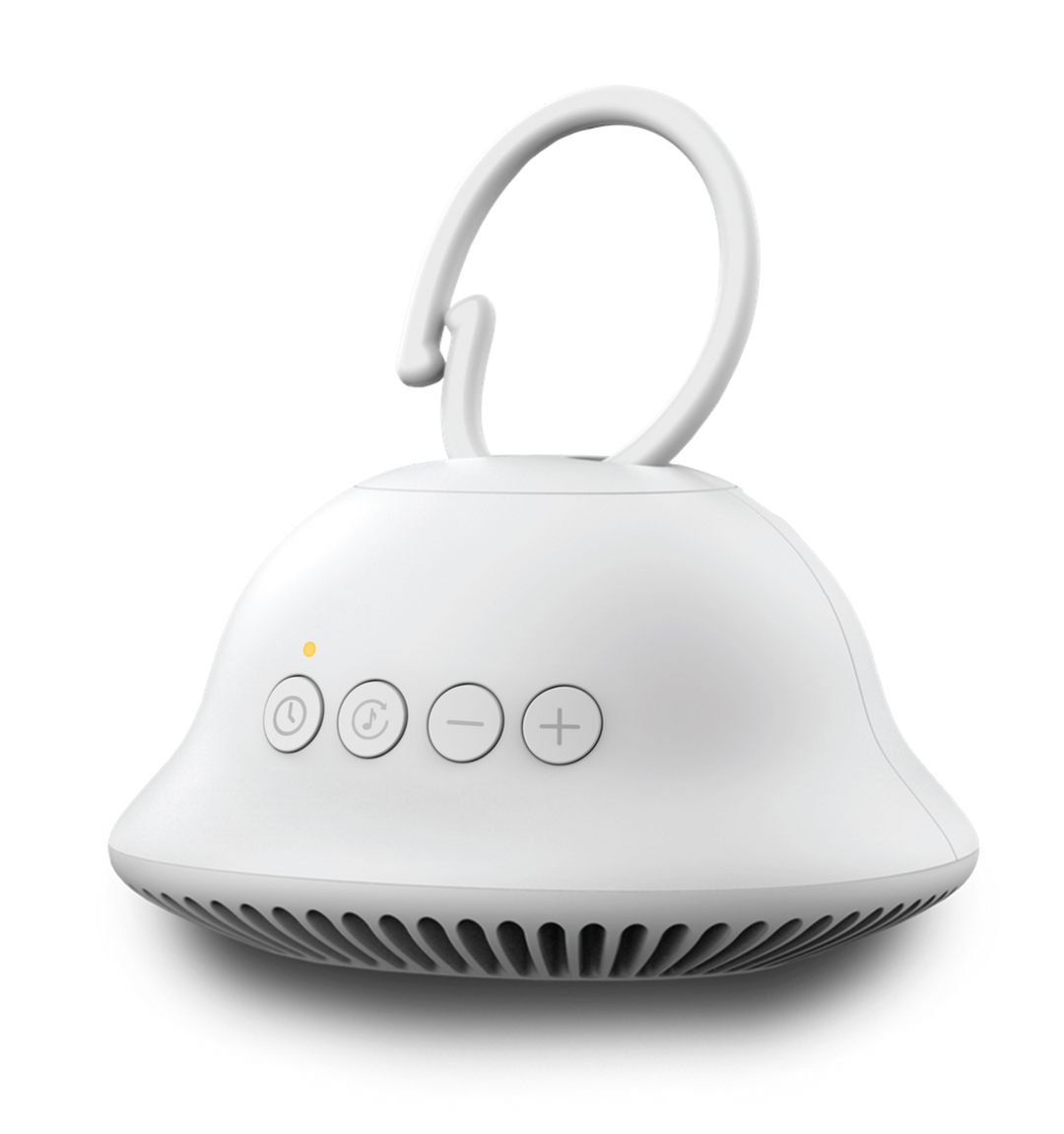 Alternate angle of baby in baby carrier sleeping with Homedics SoundSpa On-The-Go attached
