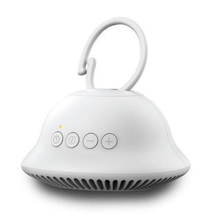 Alternate angle of baby in baby carrier sleeping with Homedics SoundSpa On-The-Go attached