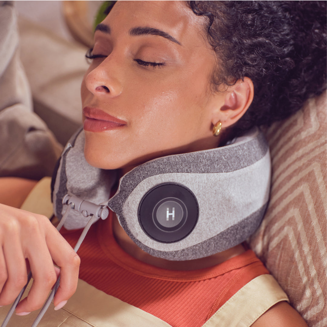 Image shows Homedics® Deep Rhythmic Neck Massager applied to neck