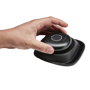 Hand reaches for the Homedics UV-Clean Portable Sanitizer Wand