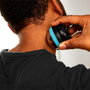 Homedics® IcyGlide™ Massage Roller Ball is used to provide relief to a sore neck