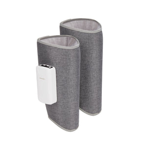 man sitting putting on his Homedics Real Relief Calf Compression Massager