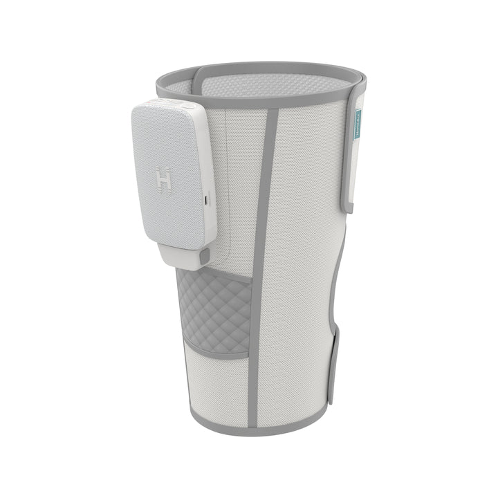 Close up view of a man setting up his Homedics® Modulair compression knee wrap.