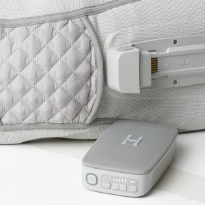 Close View of controller compartment and controller of Homedics® Modulair compression knee wrap.