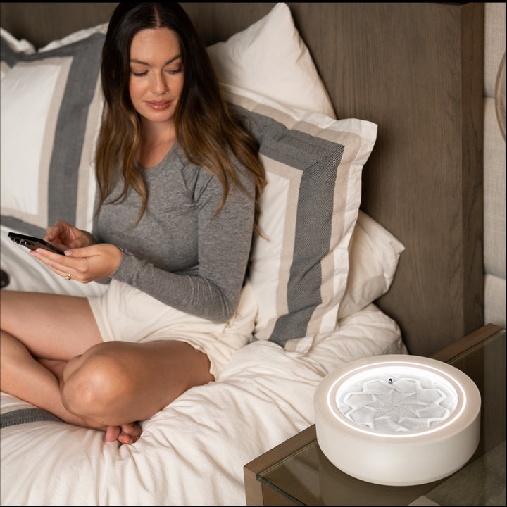 Cream | woman winds down in bed while gazing into the drift 11"