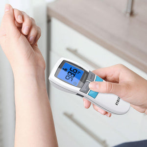 Person taking arm temperature readings from the Homedics Non-Contact Infrared Thermometer