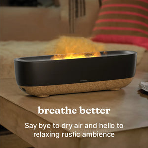 Fireside Ultrasonic Humidifier sits on the coffee table as a center piece while releasing mist into the air