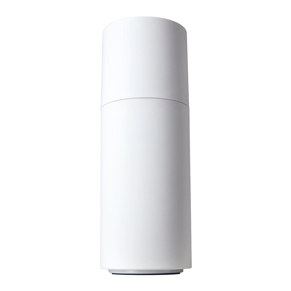 TotalComfort® Portable Ultrasonic Humidifier placed in a cupholder being used while driving in the car