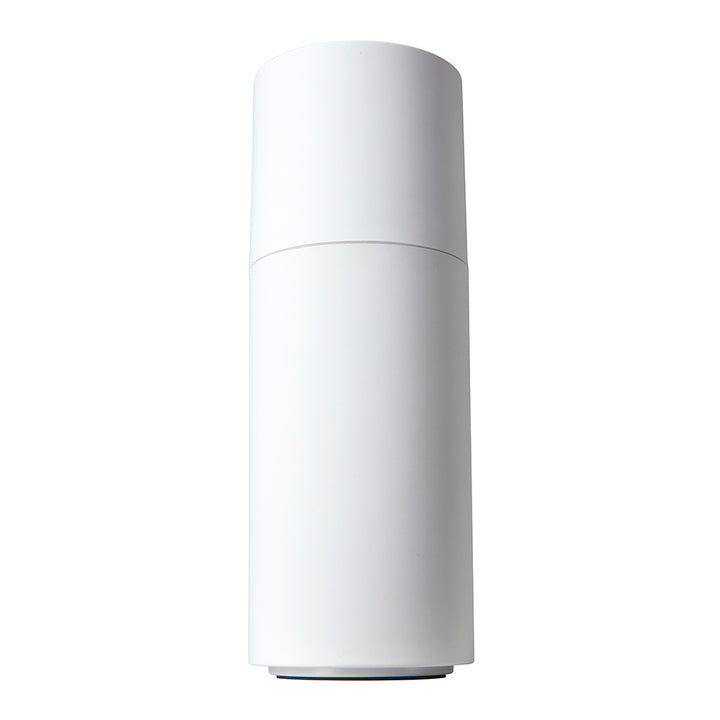TotalComfort® Portable Ultrasonic Humidifier placed in a cupholder being used while driving in the car