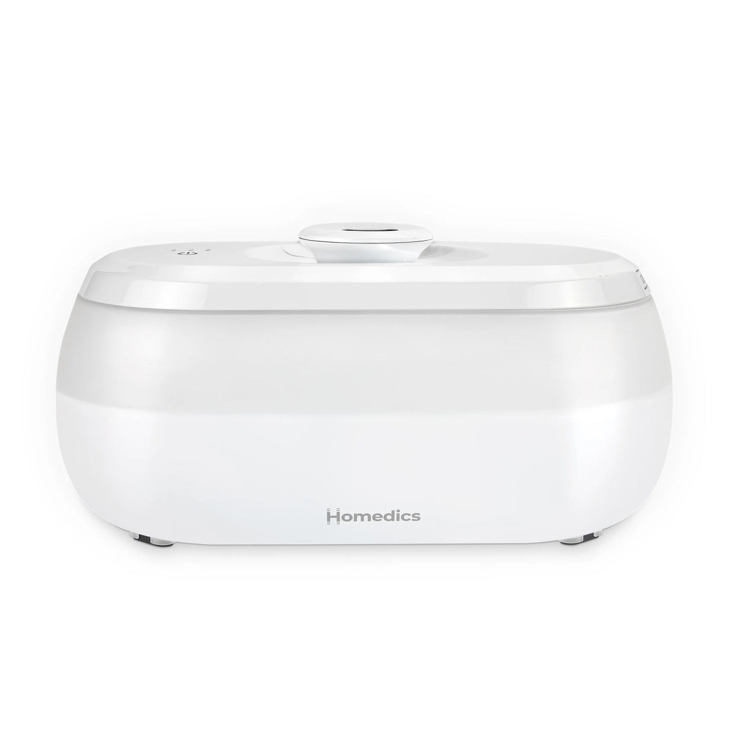 Homedics® Ultrasonic Humidifier CMTF14 releases moisture into her bedroom
