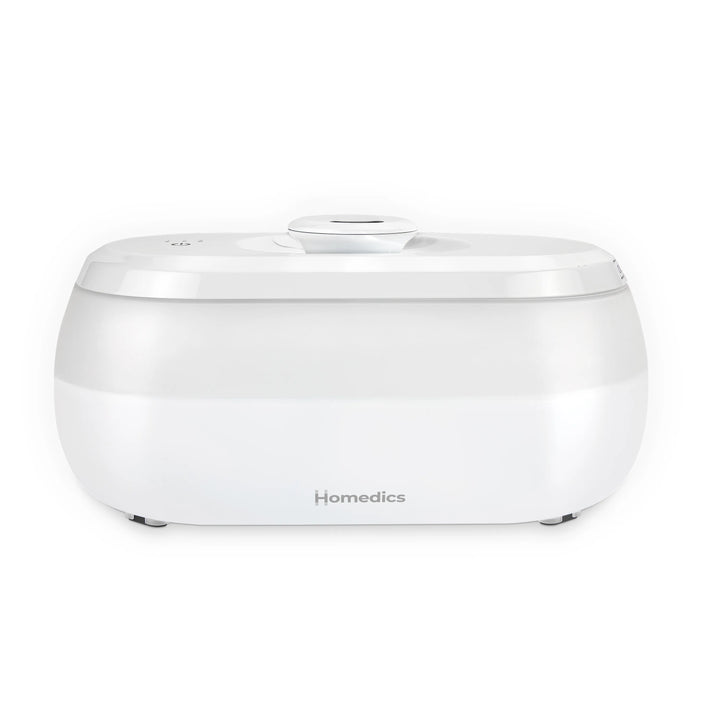 Homedics® Ultrasonic Humidifier CMTF14 releases moisture into her bedroom