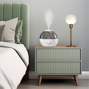 image shows Homedics® Ultrasonic Humidifier CMTF32 placed in the bedroom